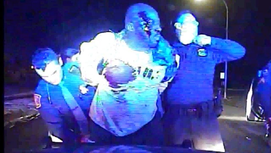 Man beaten by police cries after fired officer charged - USA TODAY