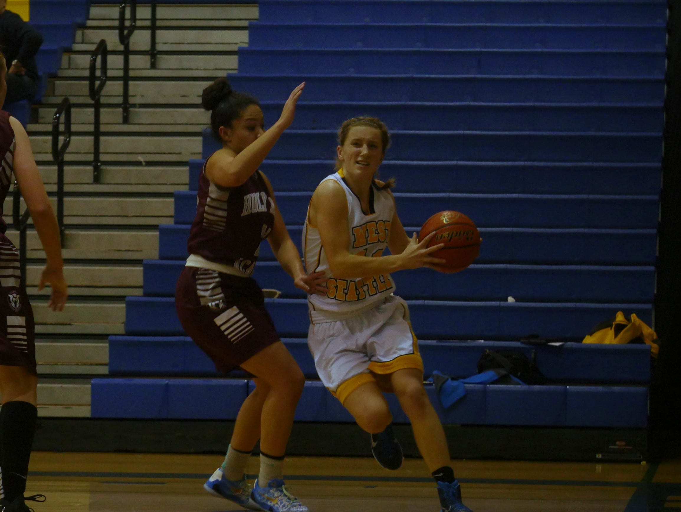 West Seattle forward Charli Elliott gets up for a shot.