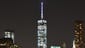 One World Trade Center, also known as the Freedom Tower, lights up the New York City skyline.