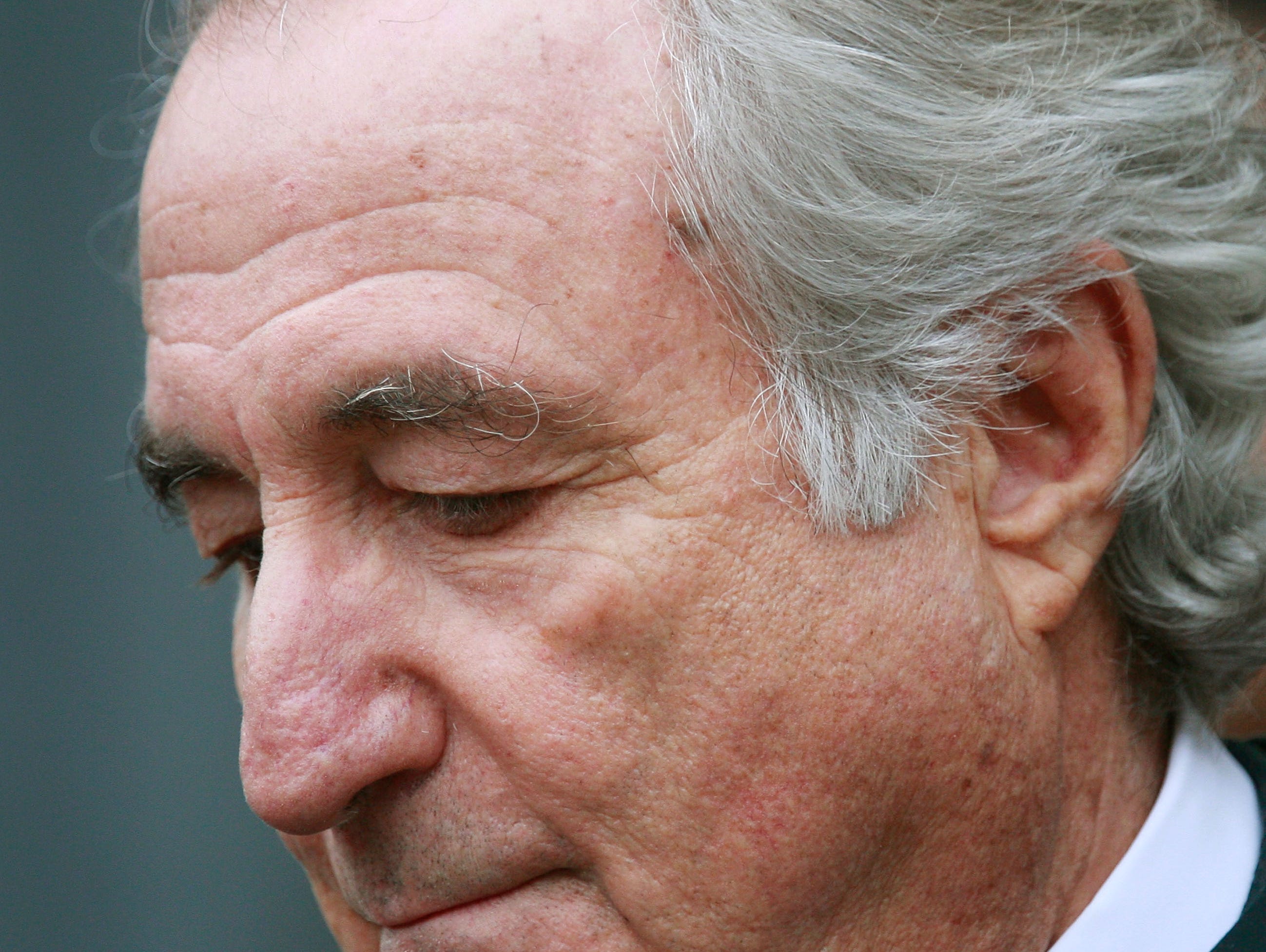 File photo taken in 2009 shows Ponzi scheme mastermind Bernard Madoff leaving a federal court hearing in New York City.