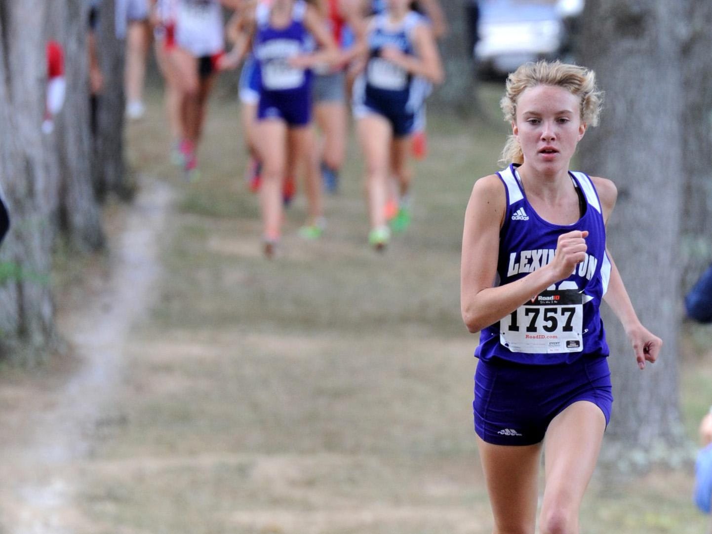 Lexington's Dominique Clairmonte goes after a repeat state title in cross country after missing the entire 2013 season with a stress fracture in her foot.