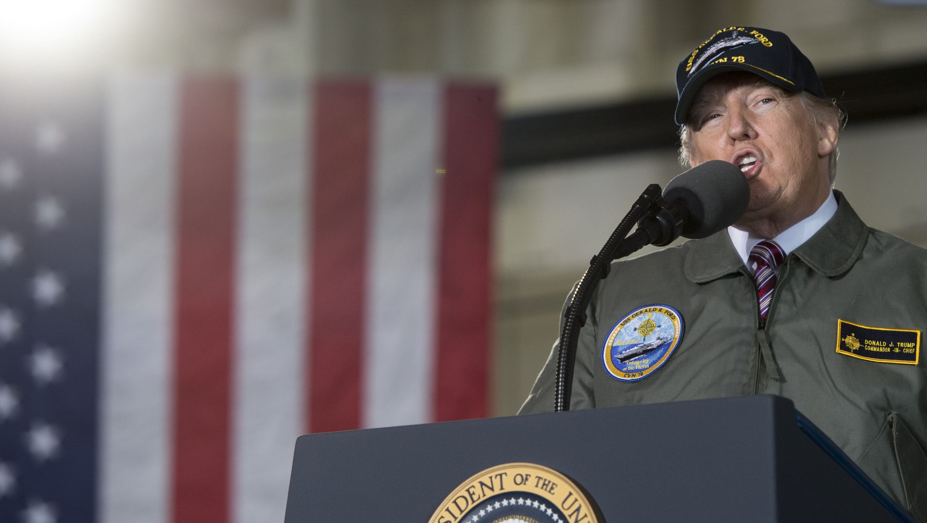 Some vets call foul on Trump for wearing flight jacket, admiral's cap