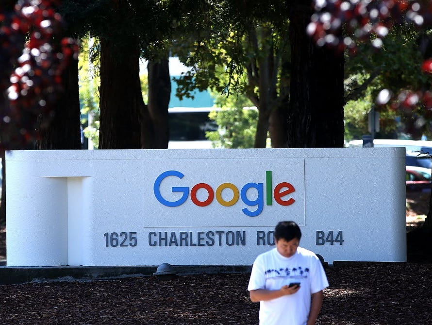 he new Google logo is displayed on a sign outside of the Google headquarters in Mountain View, Calif.