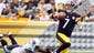 Tennessee Titans defensive end Derrick Morgan (left) brings down Pittsburgh Steelers quarterback Ben Roethlisberger (7) for a five yard loss during the second quarter at Heinz Field.