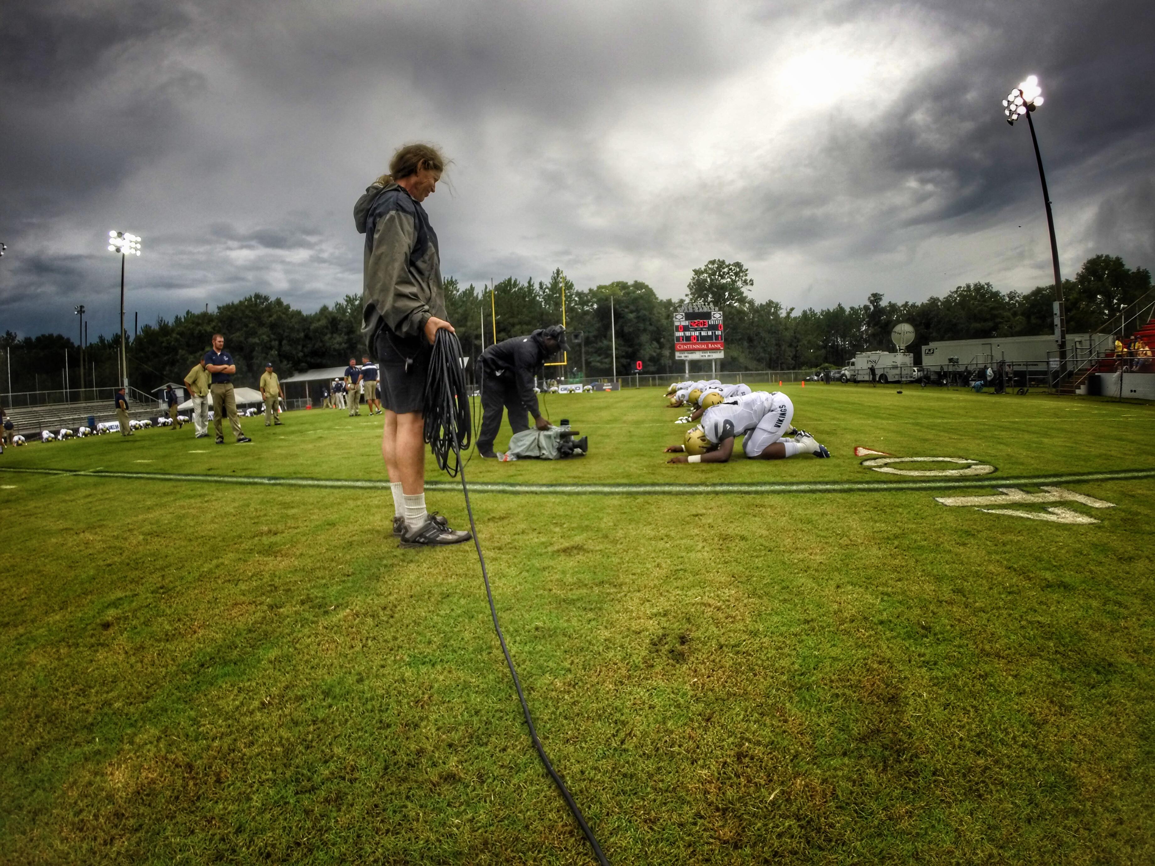 Spartanburg running back Tavien Feaster, a Clemson commit and top national recruit, gets attention from ESPN prior to a televised game against Wakulla.