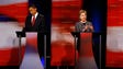 Barack Obama and Hillary Clinton take part in the first