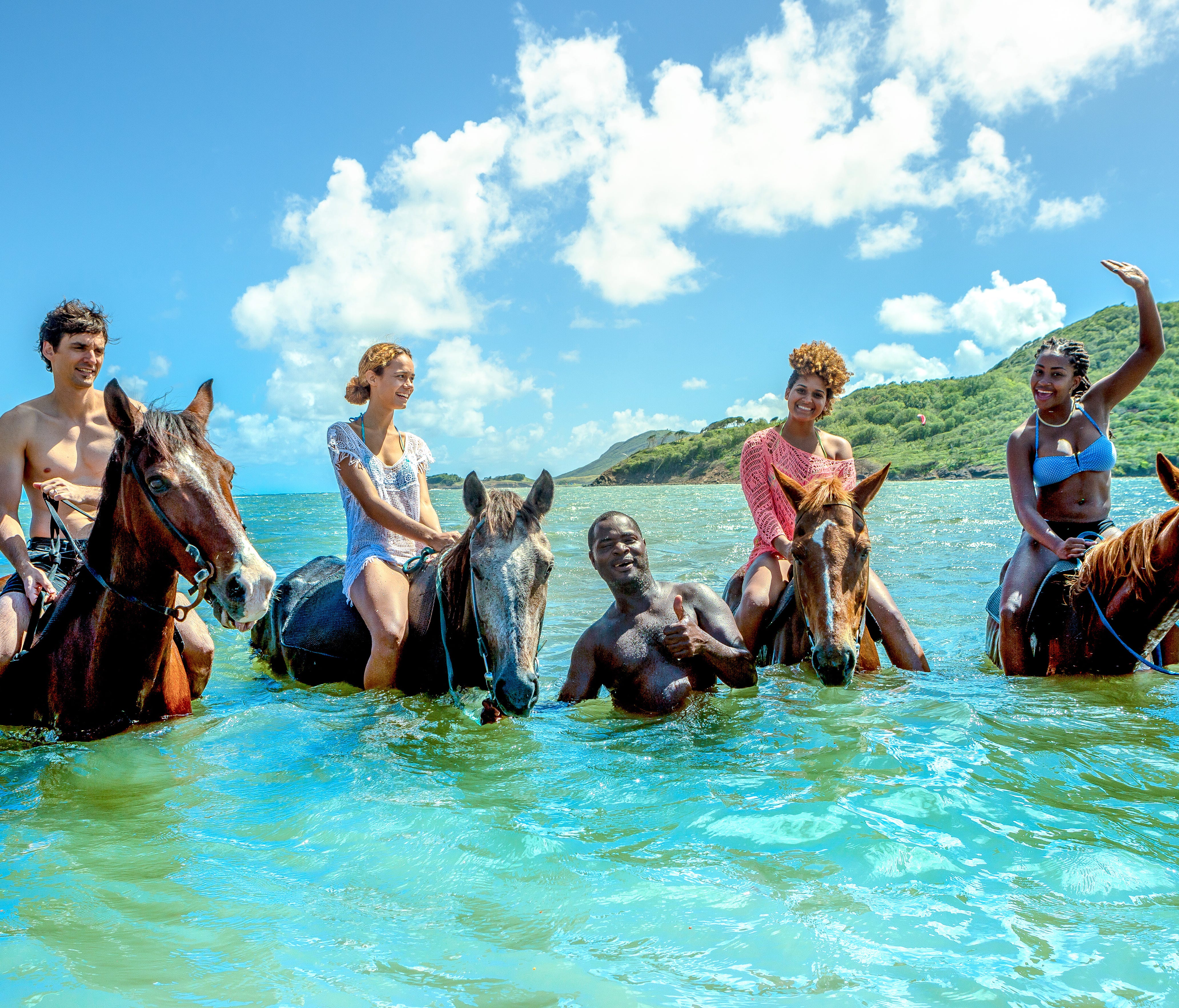 Island Routes Caribbean Adventure Tours offers horseback rides and swim adventures on Jamaica and St. Lucia.
