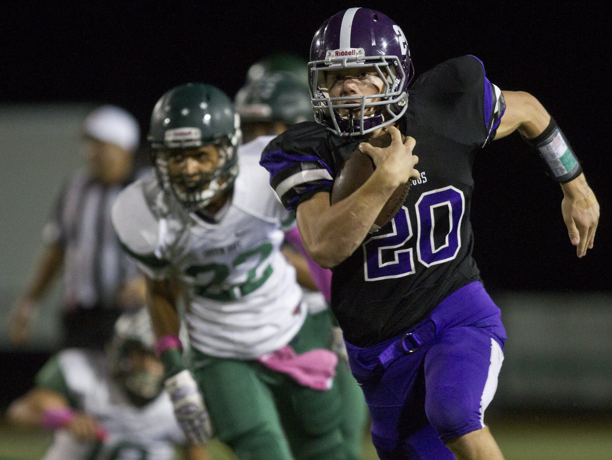 Rumson-Fair Haven running back Bryan Hess (No. 20), shown running against Long Branch on Oct. 9, will be a key player for the Bulldogs against Shore on Thursday.