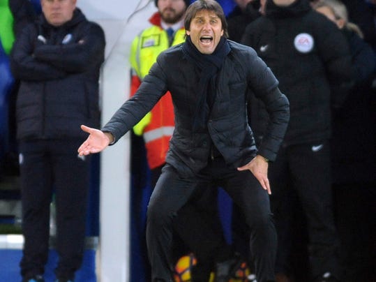 Chelsea manager Antonio Conte gestures from the sidelines during the English Premier League soccer match between Leicester City and Chelsea at the King Power Stadium in Leicester, England, Saturday, Jan. 14, 2017. (AP Photo/Rui Vieira)