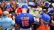 Sept. 20: Tim Tebow signs autographs for the fans.
