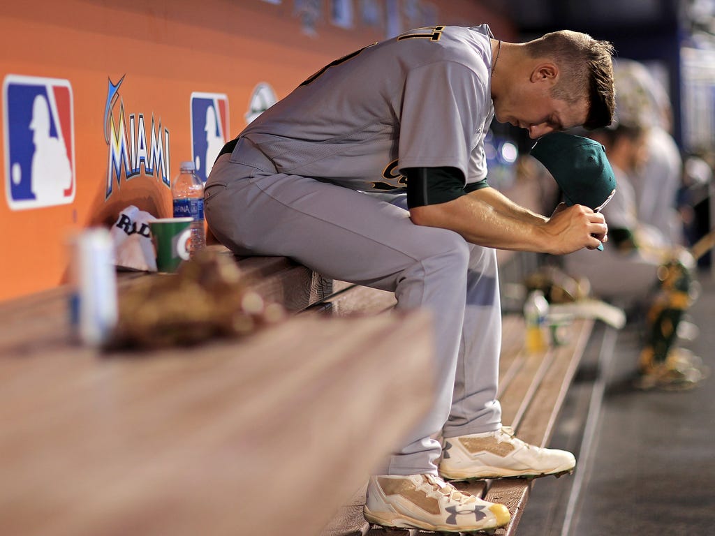 Daniel Gossett of the Oakland Athletics takes a moment before his first major league start against the Miami Marlins at Marlins Park.
