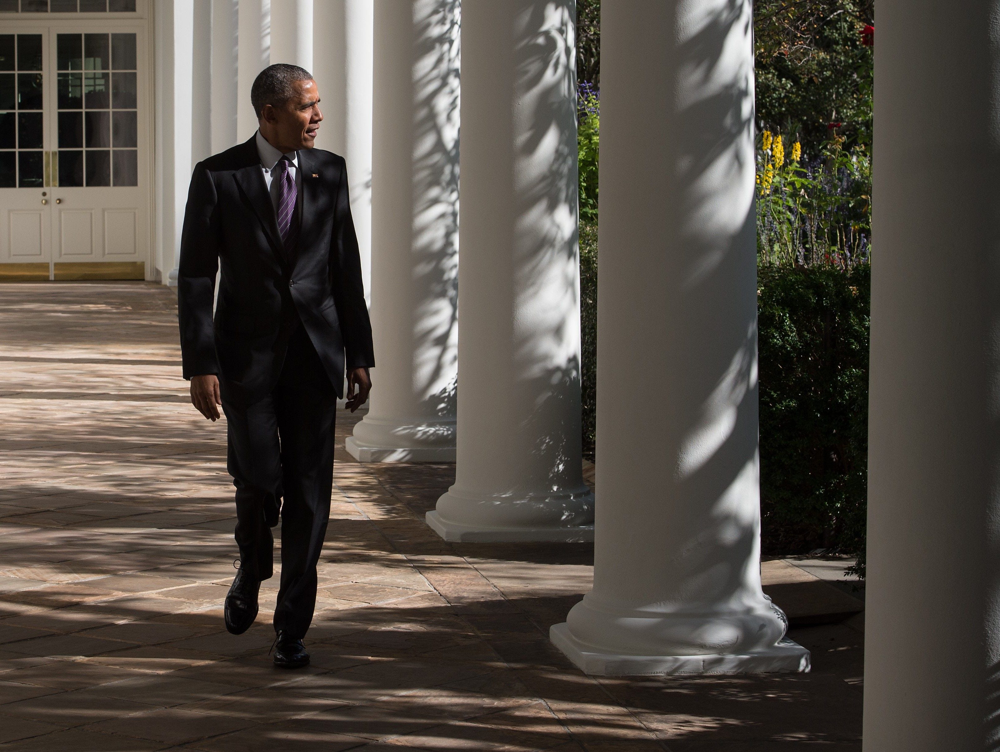 President Obama walks down the colonnade at the White House on Nov. 8, 2016.