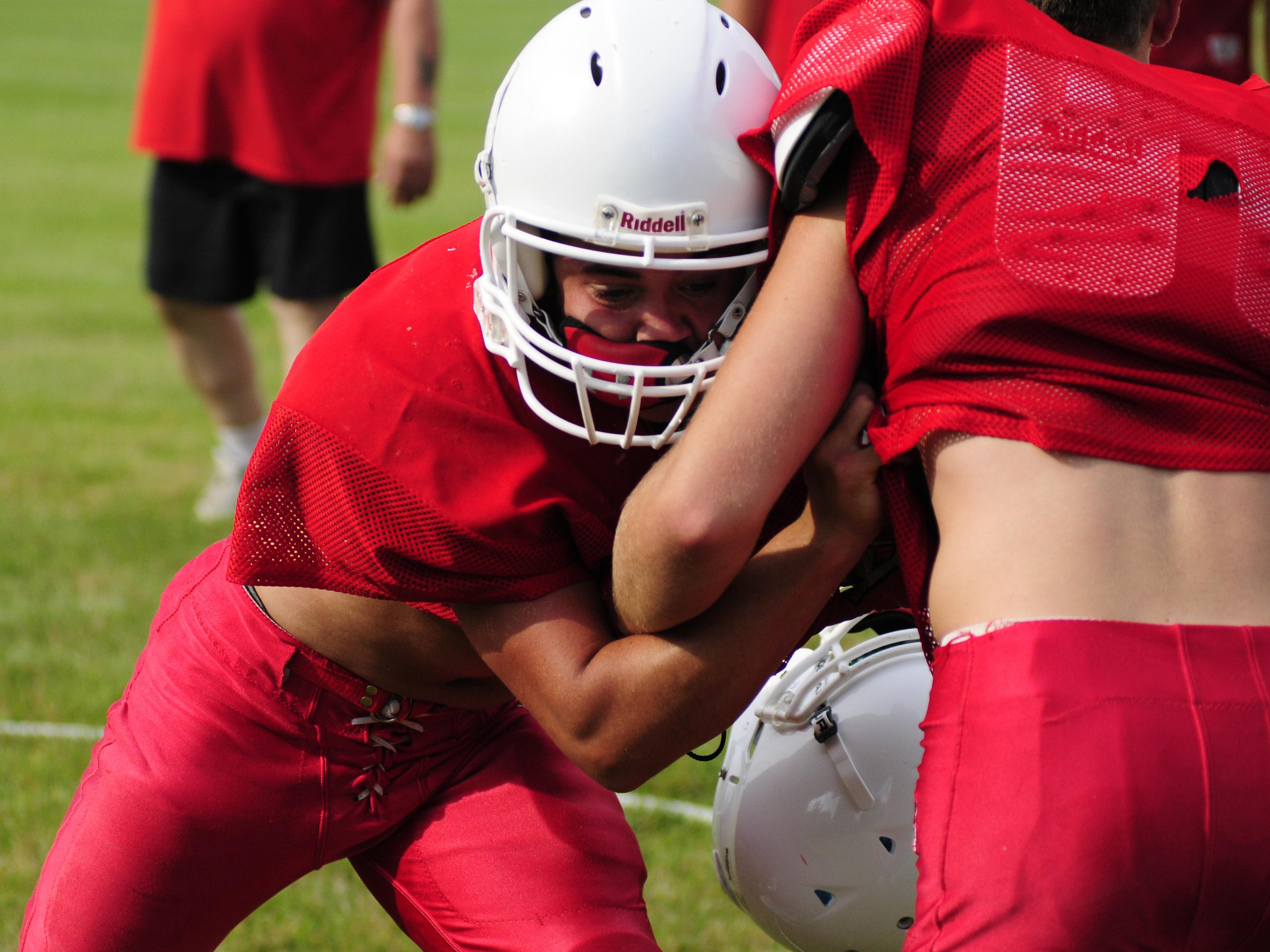 Peck senior Nathan Rosenthal competes in a drill at football practice.