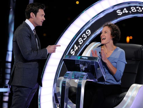 Ryan Seacrest chats with Money Chair occupant Clarice Fourari on 'The Million Second Quiz.' The floundering short-run interactive game show was beset by confusing rules and a mobile app that was prone to crashing.