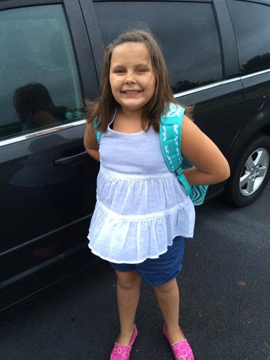 Jordan is all smiles as she gets ready to go to 4th grade