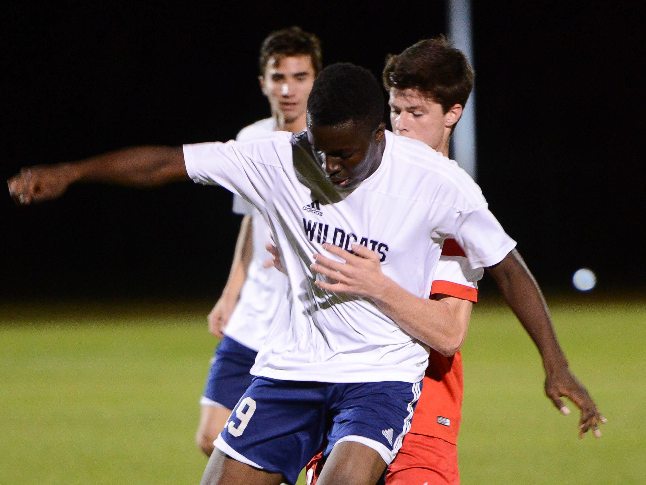 Charlie Wilkinson of Bishop Kenny tries to force West Shore's Amugo Chukwunenye off the ball during Friday's Class 2A state soccer semifinal.