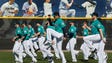 Peoria, Ariz.: Mariners stetch during a workout.