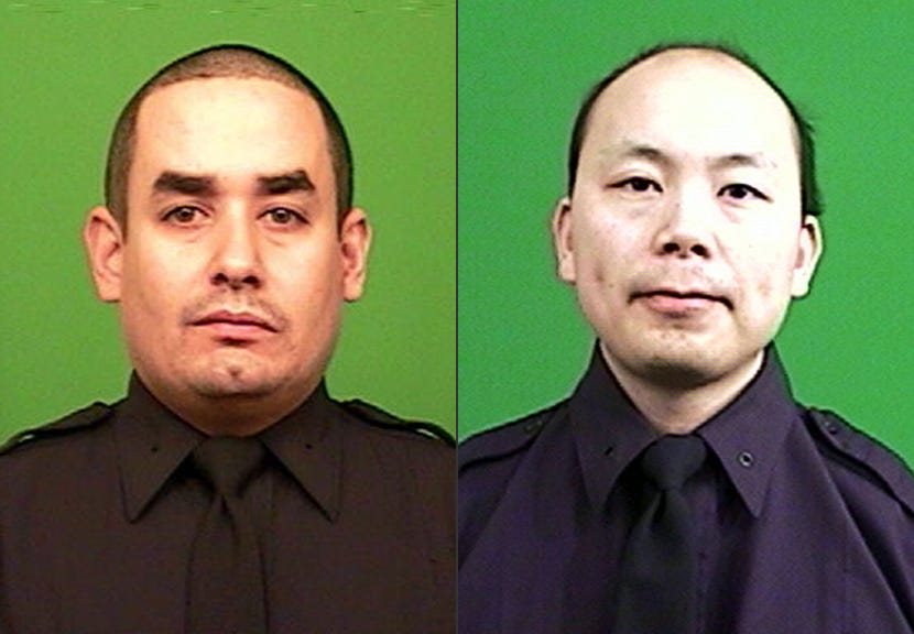 In a sea of blue, NYC cops honor slain officer