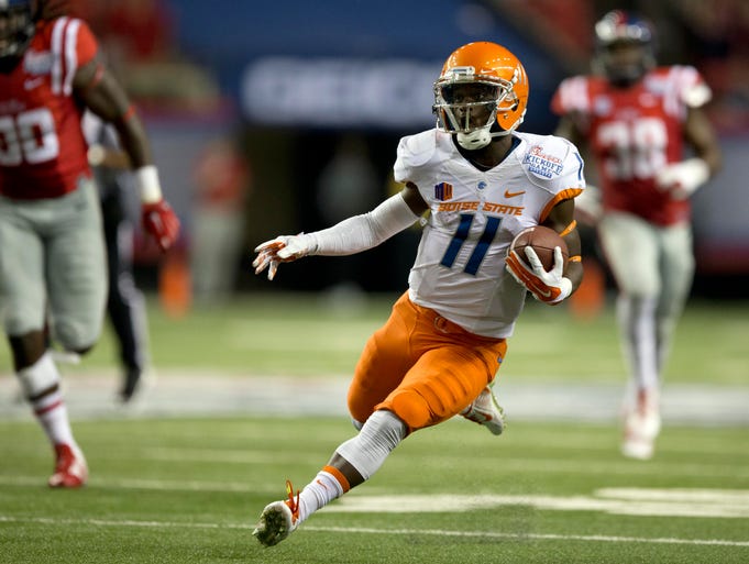 Boise State wide receiver Shane Williams-Rhodes runs against Ole Miss at the Georgia Dome.