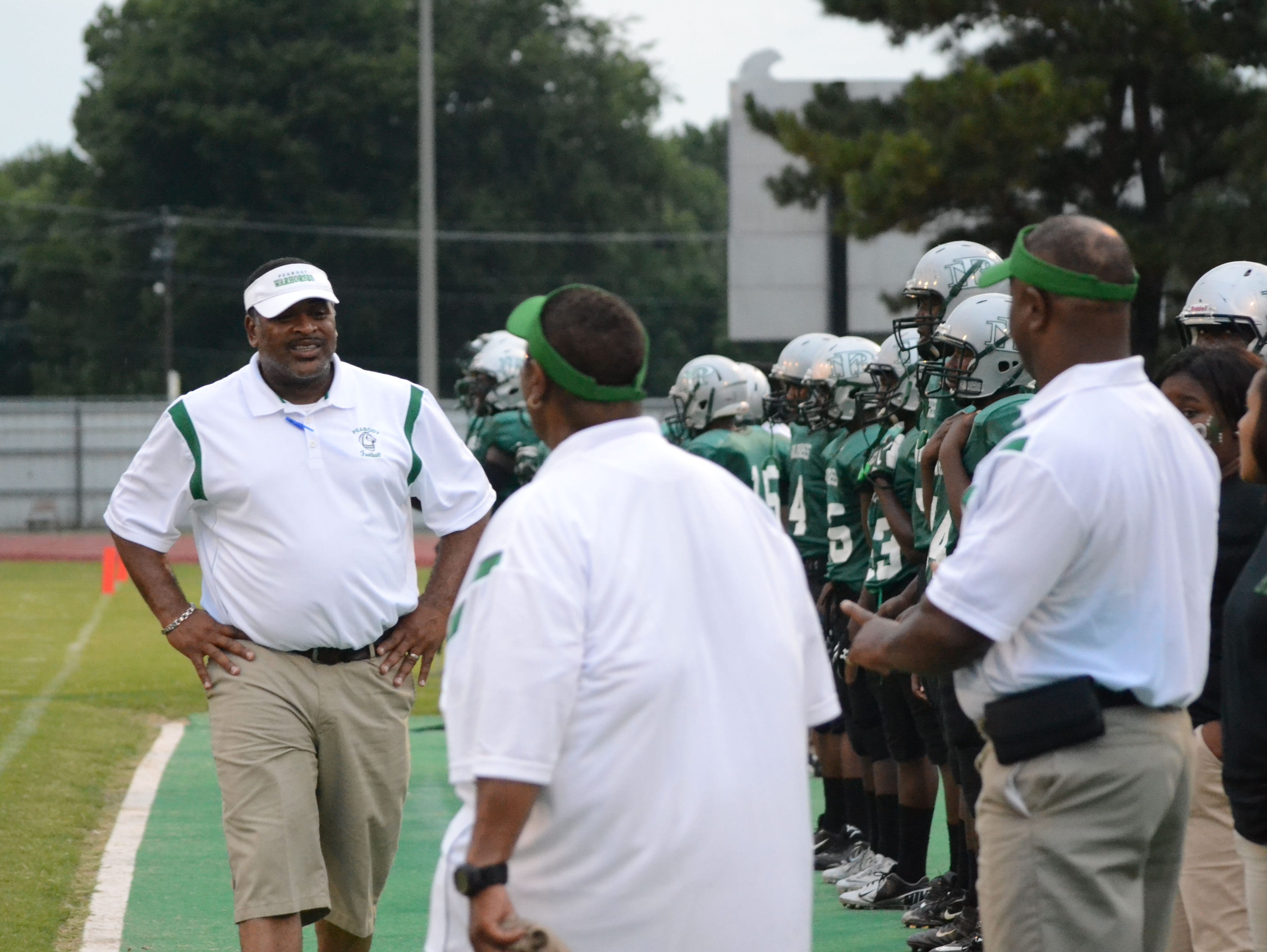 Toriano Williams (left), who was the All-Cenla Football Coach of the Year after leading Peabody to its first playoff win in five decades last year, was fired Wednesday after just one season with the Warhorses.