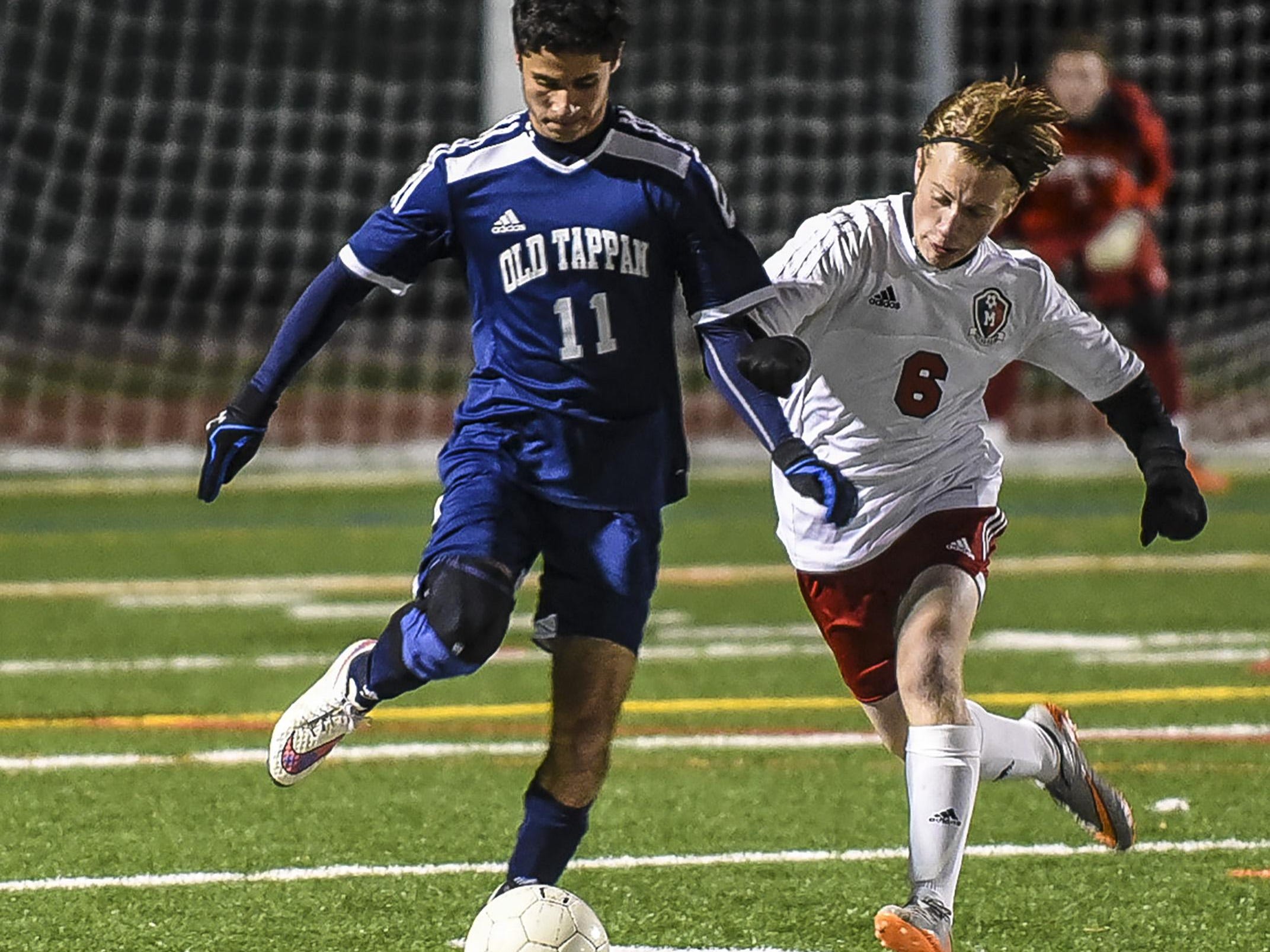 Old Tappan's Conor Kelly (10) and Mendham's Matt Hanks (6) vie for the ball in the NJSIAA Group III Semifinal at Ridge High School in Basking Ridge, November 17, 2015. Photo by Warren Wetura for the Daily Record.