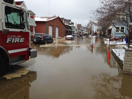 January 9, 2015: Workers attempt to shut off water