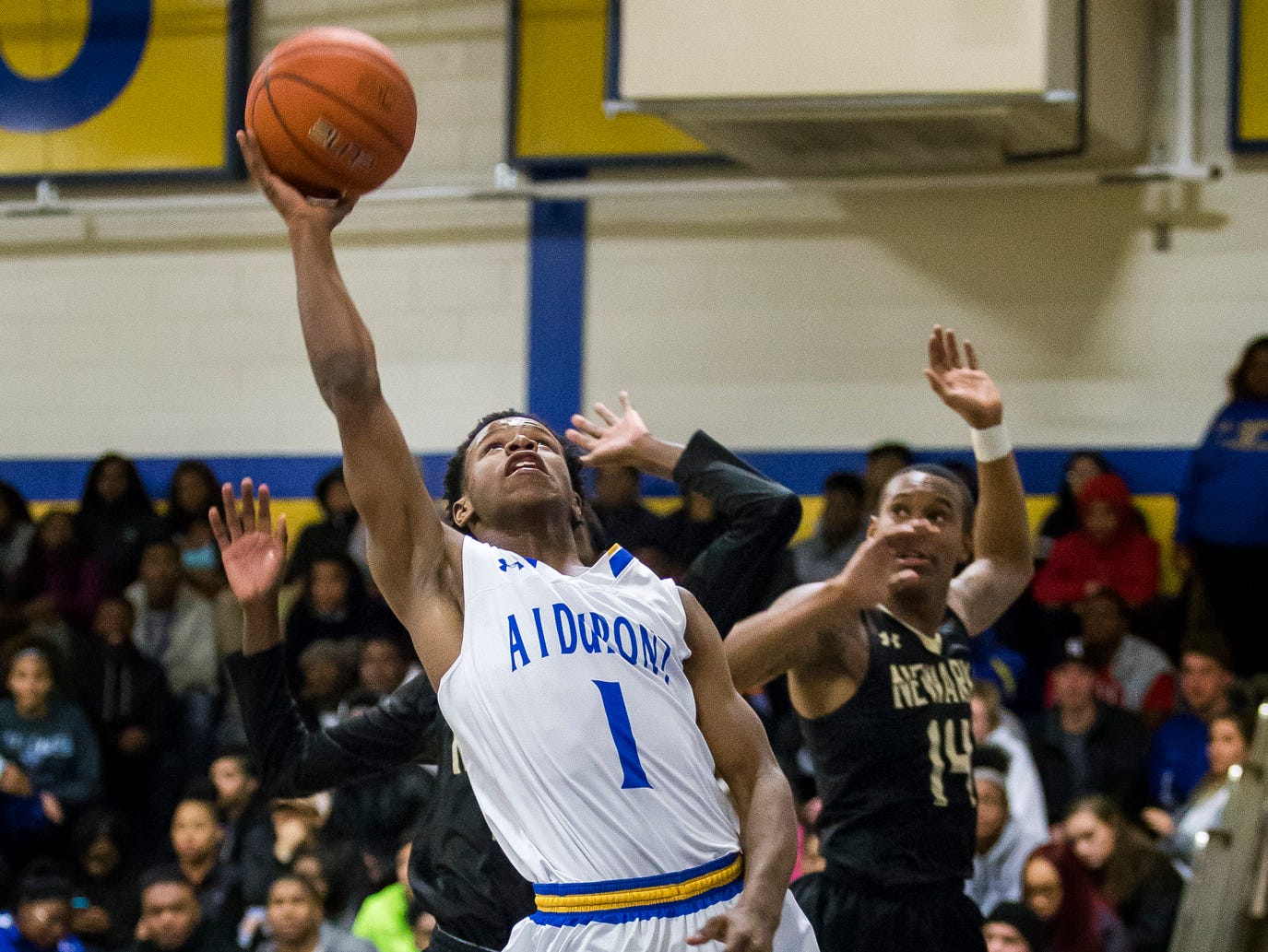 A.I.'s Julius Inge puts up a shot in the fourth quarter of Newark's 52-51 win over A.I. duPont High School in Greenville on Tuesday evening.
