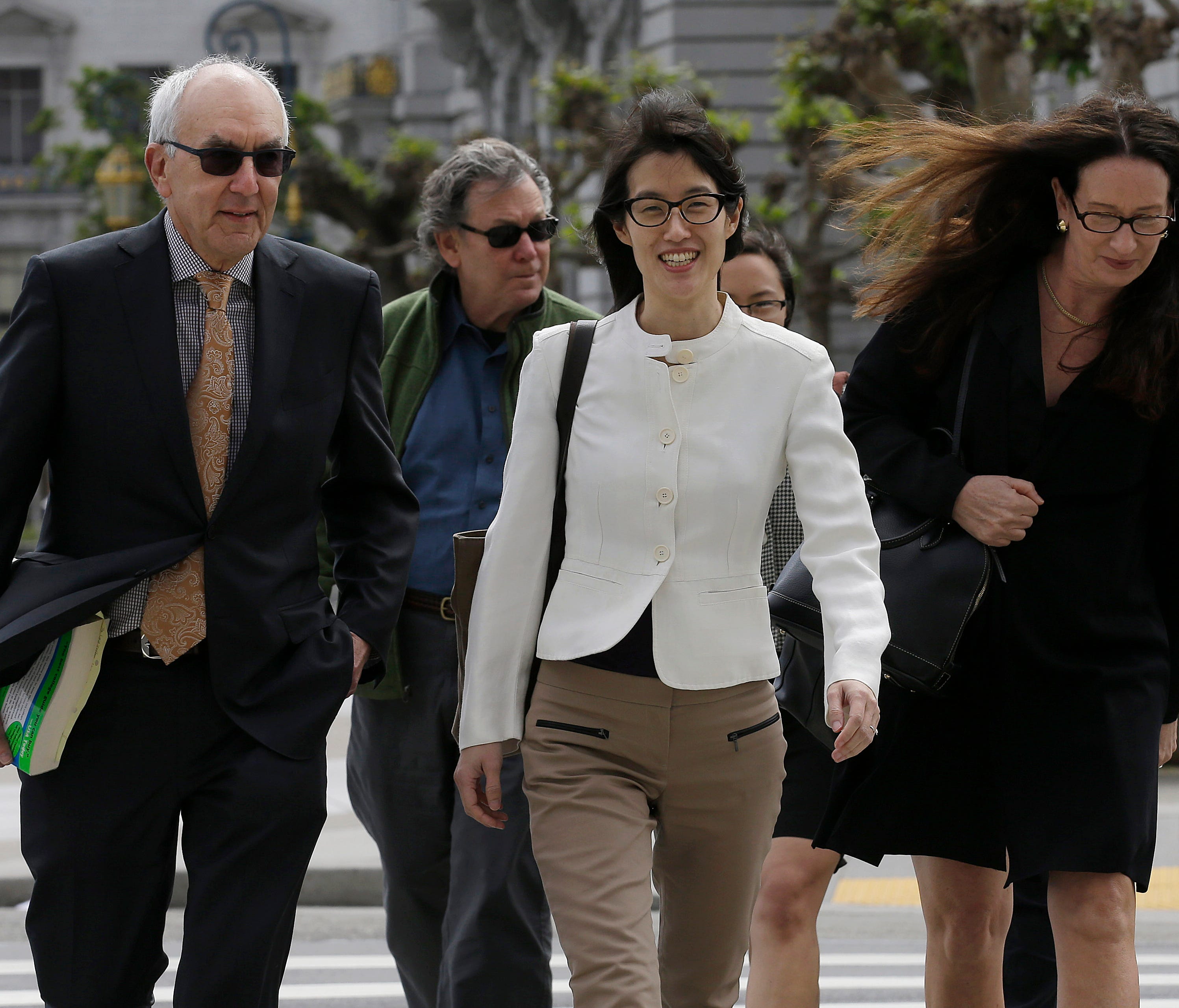 Ellen Pao, center, walks to Civic Center Courthouse in San Francisco March 27. A jury ruled against Ellen Pao in her sex discrimination case against venture capital firm Kleiner Perkins Caufield & Byers.