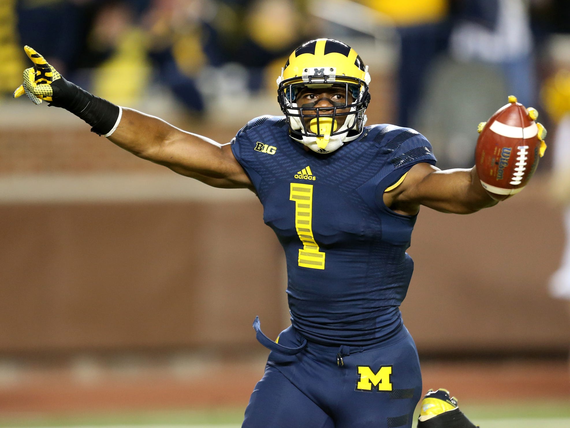 Devin Funchess of Farmington Hills catches a touchdown pass in Michigan Stadium.