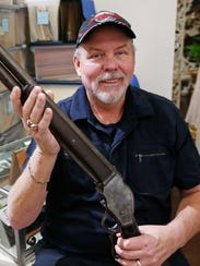 John Anderson with Wyatt Earp's shotgun