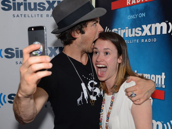 Ian Somerhalder and Julia Cunningham take a selfie after being interviewed on SiriusXM's Entertainment Weekly Radio channel from Comic-Con 2014 in San Diego, Calif.
