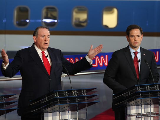 Mike Huckabee and Marco Rubio take part in the presidential