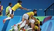 The Colombia women's soccer team celebrates during