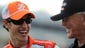 Joey Logano laughs with team owner Joe Gibbs during qualifying for the NASCAR Sprint Cup Series Coca-Cola 600 at Charlotte Motor Speedway on May 26, 2011, in Charlotte, N.C.