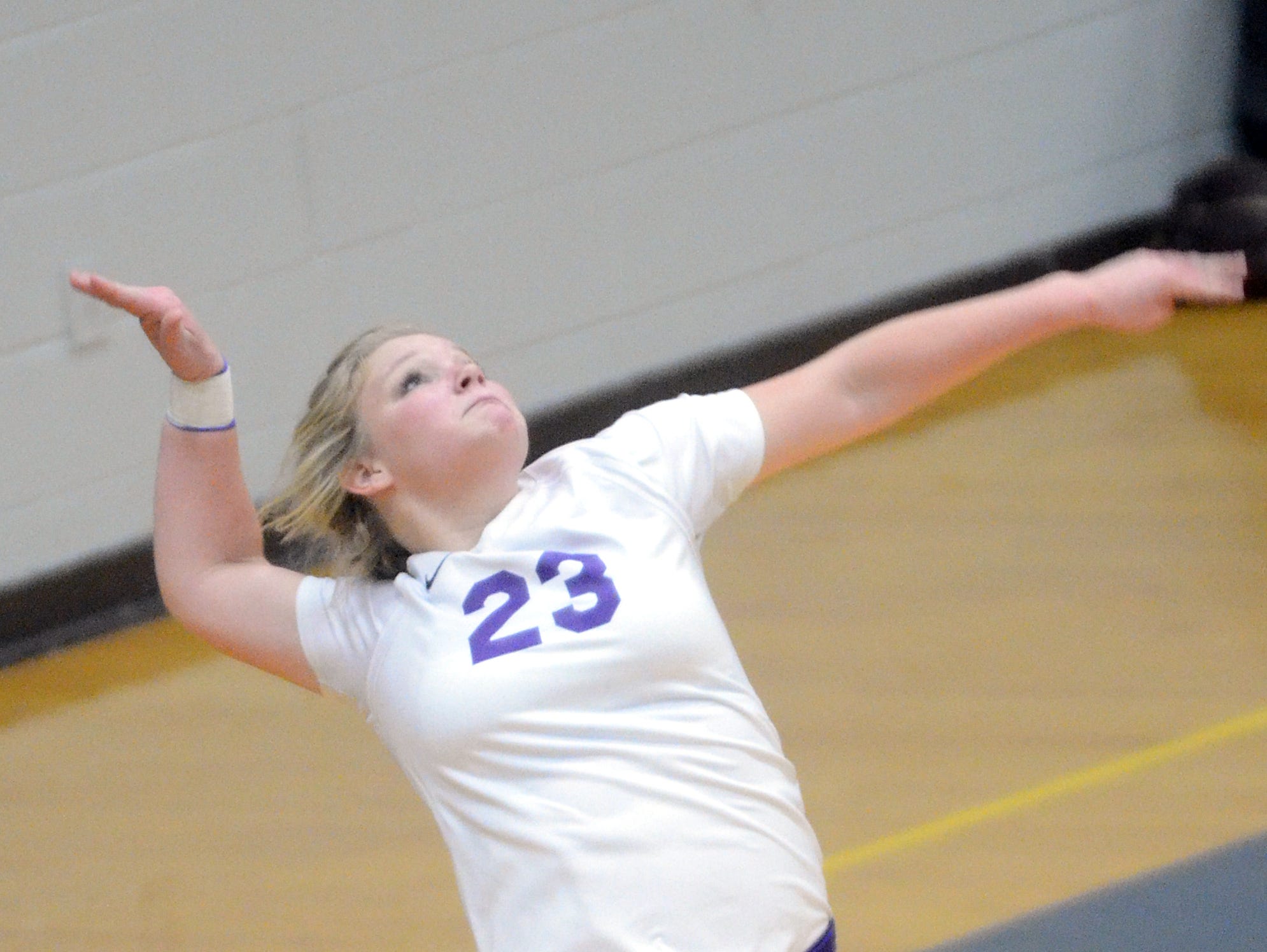 Portland High sophomore Lexi Wakefield elevates to hit a jump serve during the third game.