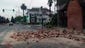 Bricks from a damaged building spill out into a Napa, Calif., street.