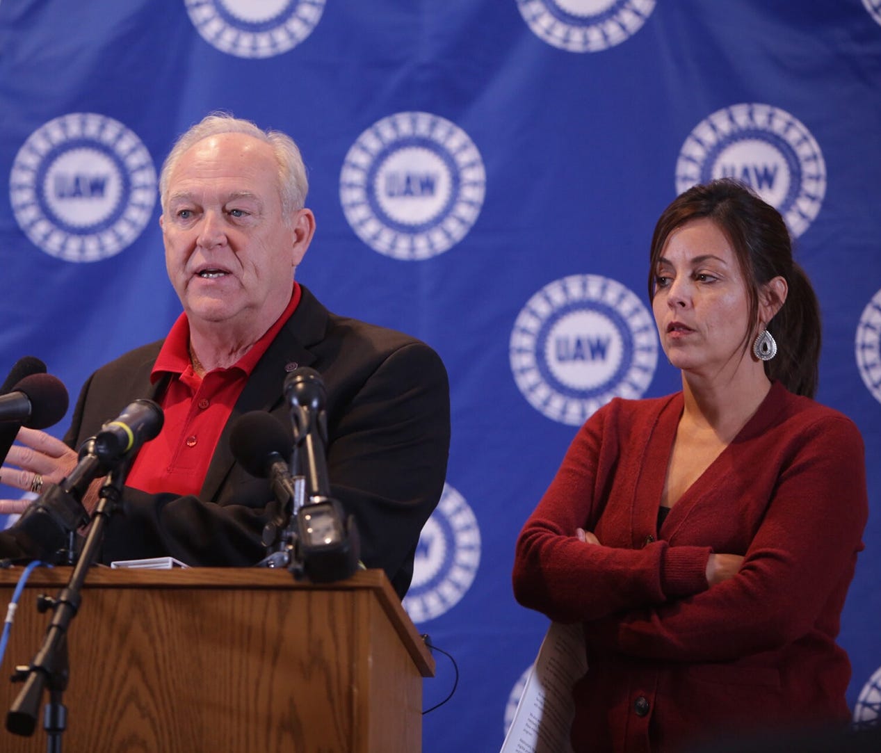 UAW President Dennis Williams speaks and Vice President Cindy Estrada listens Wednesday, Oct. 28, 2015, at the UAW-GM Center for Human Resources in Detroit. Details of the detail with GM were released. Voting will take place over the next couple of w