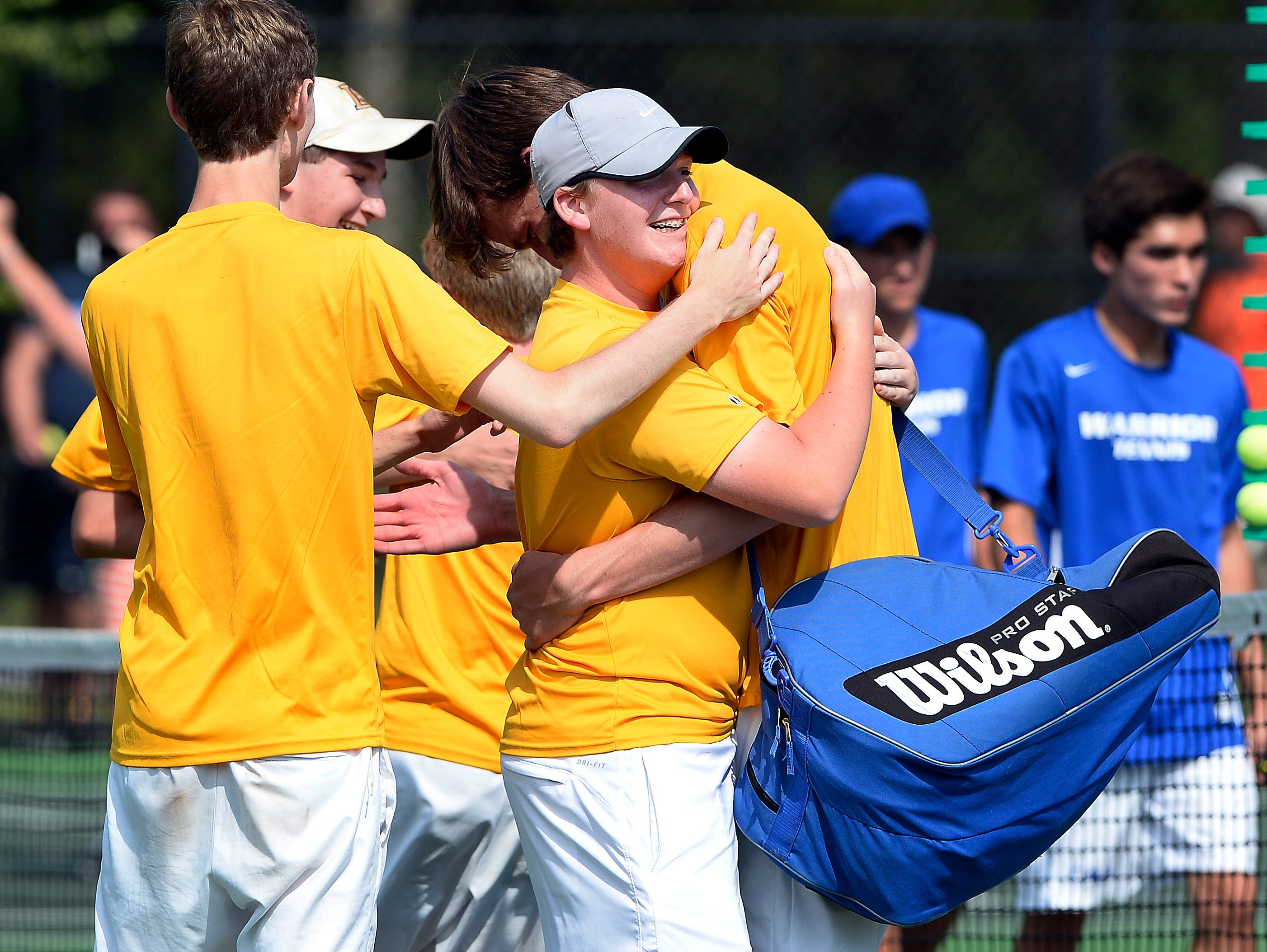 Lipscomb High School players celebrate after defeating Christian Academy of Knoxville 4-2 during the Tennessee Class A-AA boys team tennis championship final Wednesday, May 25, 2016, in Murfreesboro, Tenn.