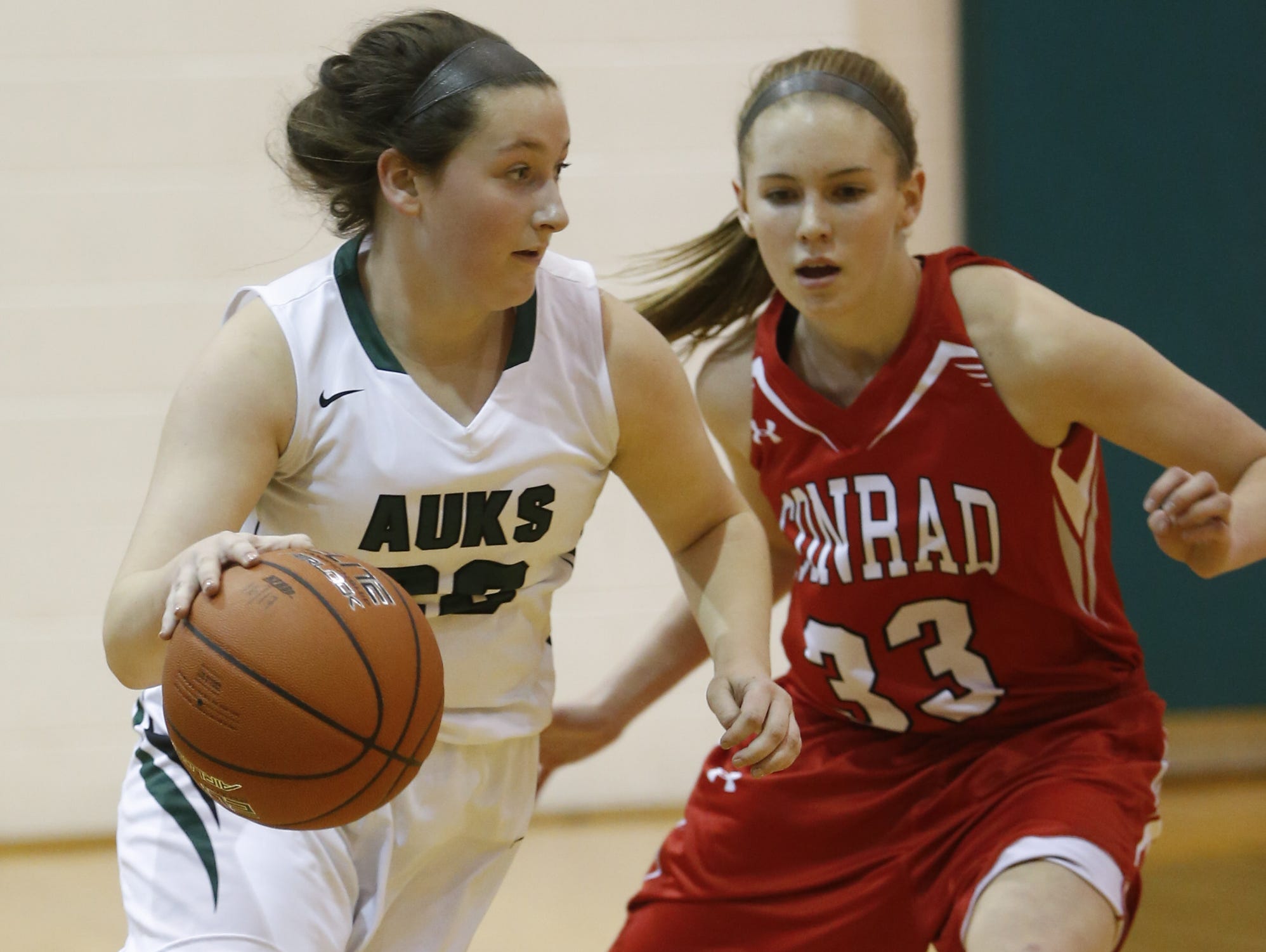 Archmere's Emma McCann (22), seen here against Conrad, led her team with nine points as the Auks defeated Wilmington Friends 34-26 in the first round of the DIAA girls basketball tournament on Tuesday.