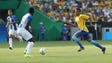 Neymar of Brazil dribbles the ball against Honduras