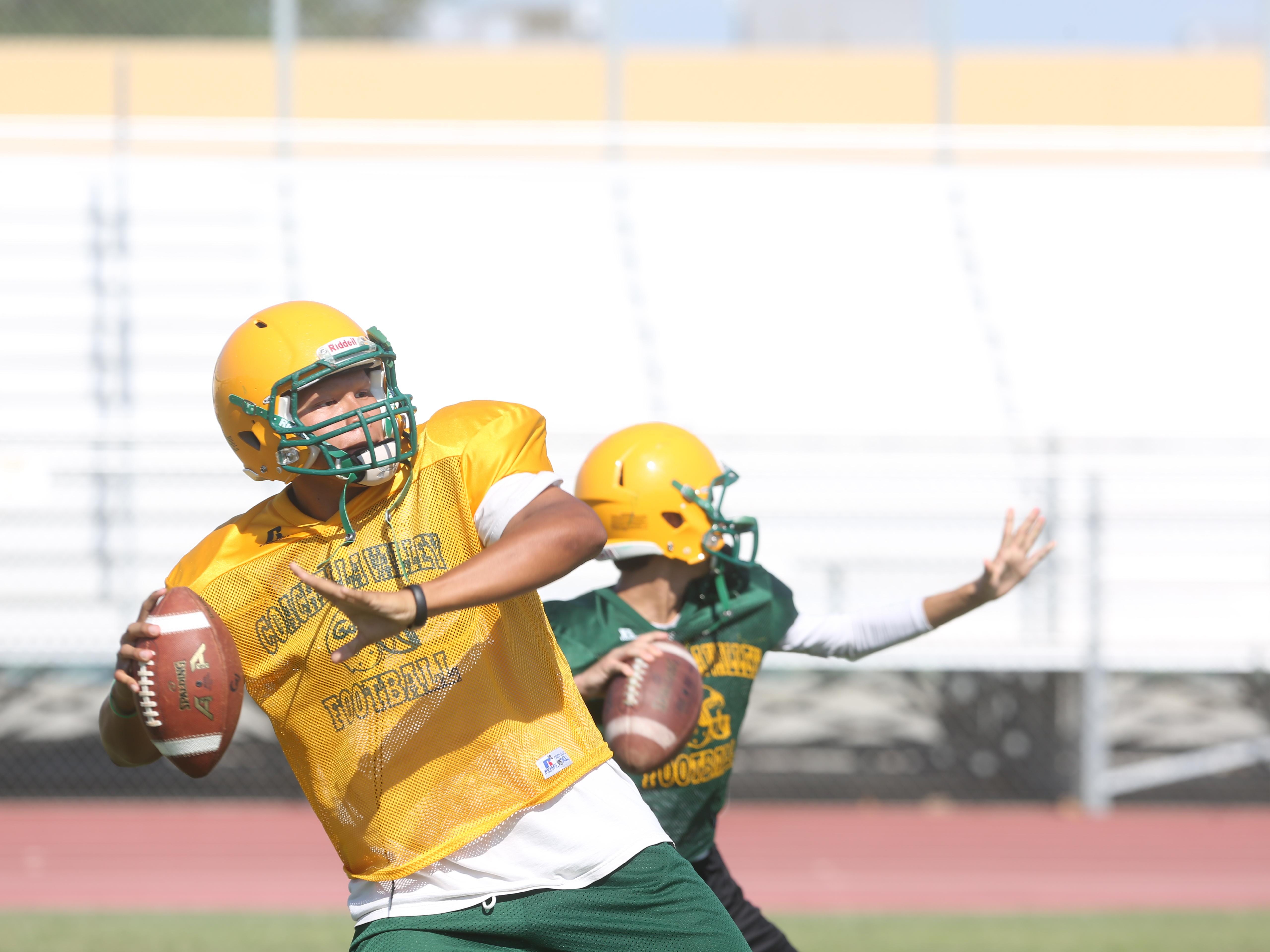Coachella Valley senior quarterback Darius Hulsey throws during a recent practice. Hulsey threw for 3,206 yards and 29 touchdowns in 10 games last season.