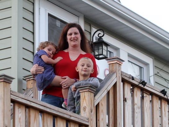 Laura Murray at home in the Highlands with her son