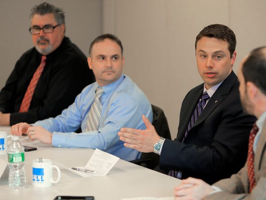 Toby Stark (right) from Stark Associates speaks during