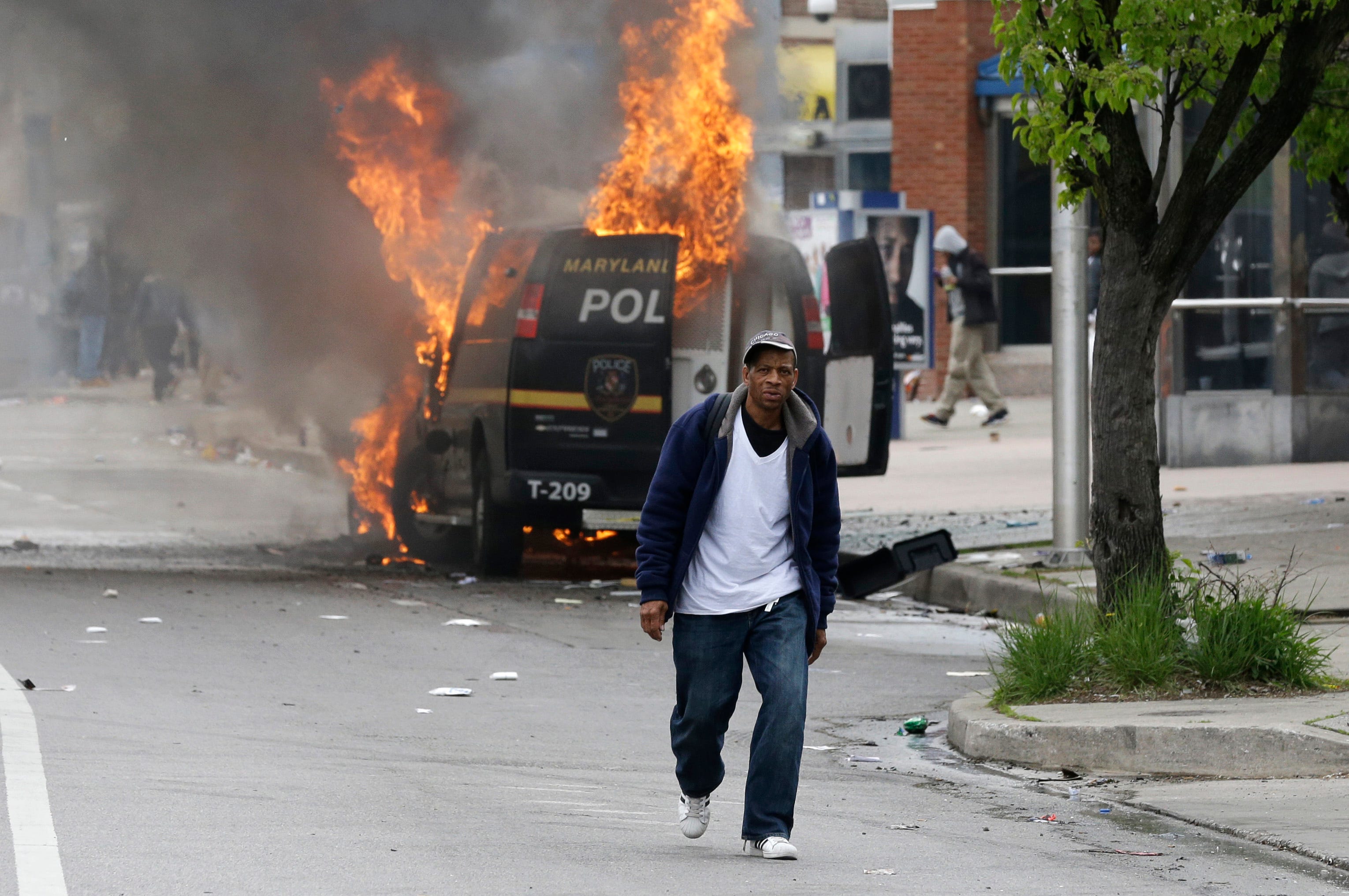 Baltimore police, protesters clash; 15 officers hurt
