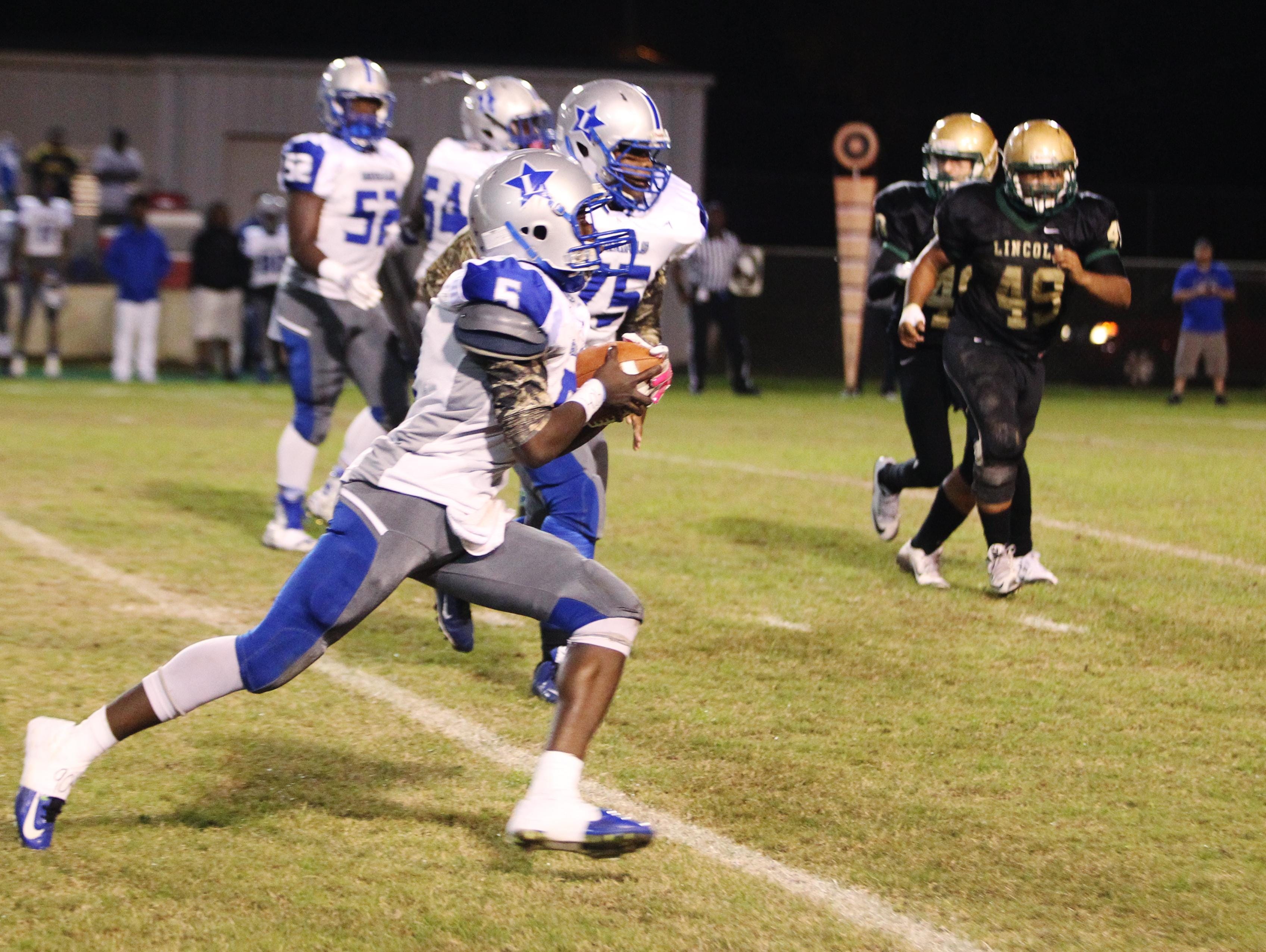 Lee's Derrick Jones rushed for 167 yards and three touchdowns and threw for 140 yards and a score, but he also threw two costly interceptions as Lincoln won 44-41 in overtime.