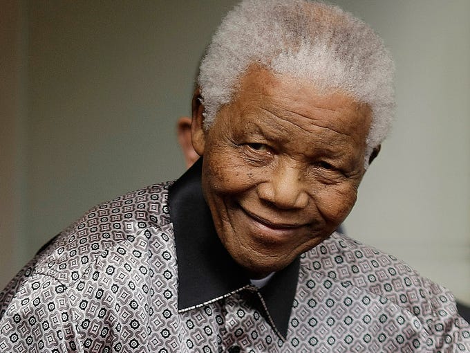 Former South African president Nelson Mandela leaves the Intercontinental Hotel on June 26, 2008, in London.