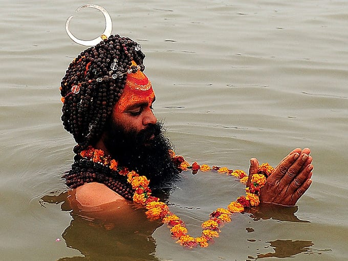 Hindus Worship At The Maha Kumbh Festival