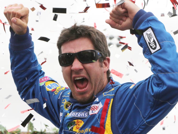 Martin Truex Jr. celebrates in victory lane after winning the Sprint Cup Series Toyota/Save Mart 350 at Sonoma Raceway. It was his first win since June 2007.