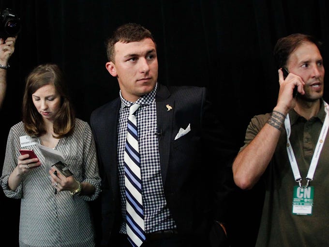 Texas A&amp;M Aggies quarterback Johnny Manziel waits to go onto the set of ESPN during the 2013 SEC football media days at the Hyatt Regency.