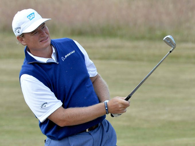 Ernie Els hits from the 2nd fairway during the first round for the 2013 The Open Championship at Muirfield Golf Club.